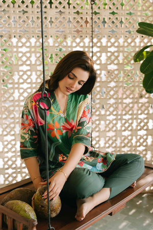 Woman sitting on a swing with a decorative background


